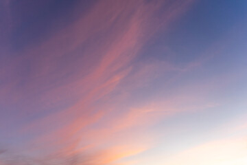 Colorful sunset with pastel hues over a serene sky