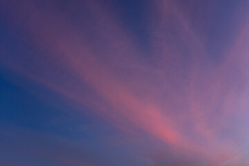 Colorful twilight sky with soft clouds in evening light