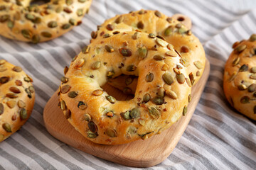 Homemade Healthy Organic Pumpkin Seed Bagels for Breakfast, side view.