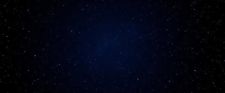 Seamless loop of twinkling stars in a dark, starry night sky, glowing with blue starlight, blinking, galaxy