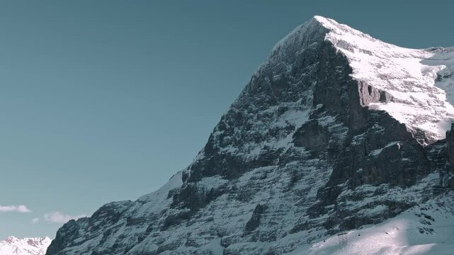 Beautiful Snowcapped Mountain Peak Eiger North Face at 3970 Meter High in a Sunny Winter Day in Grindelwald, Kleine Scheidegg, Bernese Oberland, Bern Canton, Switzerland.