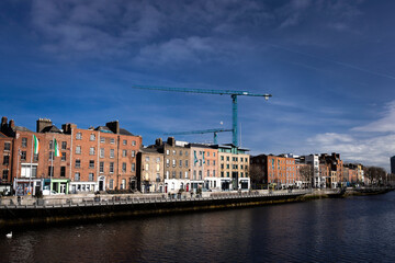 Dublin, Ireland  - March 6th 2025 - view of buildings along the River Liffy