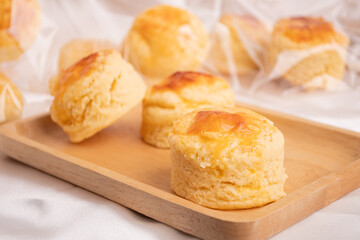 Homemade Cheese Scone on wooden plate