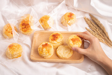 Homemade Cheese Scone on wooden plate