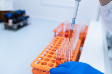 The scientist experimented in the laboratory.