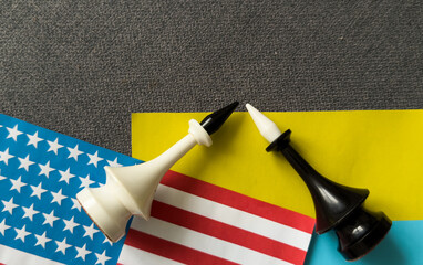 Chess pieces on the flags of the United States and Ukraine