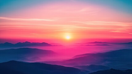 Obraz premium Sunrise over Misty Mountain Range.