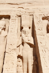 Colossal standing statue of Nefertari at entrance of the Temple of Nefertari, Egypt