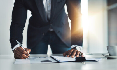 Businessman, writing or documents with contract for corporate agreement or legal policy in office. Signature, man or accountant with paperwork for company assets, report or compliance at workplace