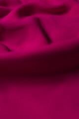 Vibrant Magenta Fabric with Soft Folds – Elegant Abstract Textile Background