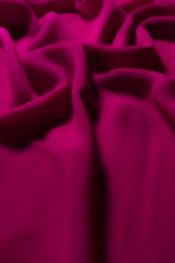 Vibrant Magenta Fabric with Soft Folds – Elegant Abstract Textile Background