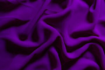 Vibrant Purple Fabric with Soft Folds – Elegant Abstract Textile Background