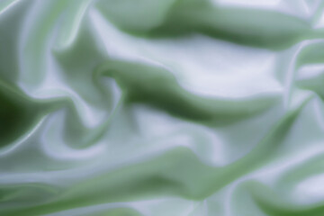 Elegant Light Blue Satin Fabric with Soft Folds – Abstract Texture