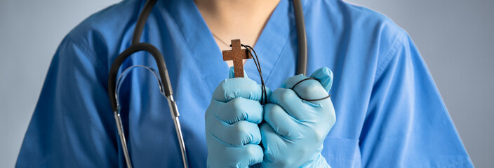 Christian Doctor Praying in Faith