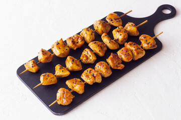 Chicken skewers in teriyaki sauce. Asian food.