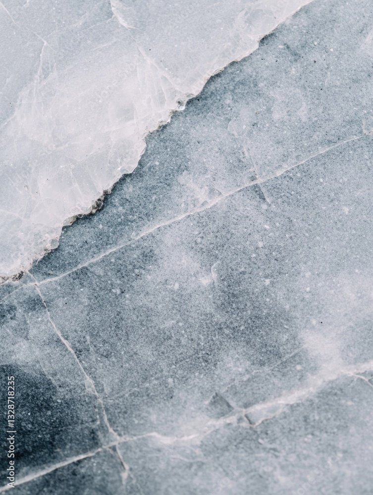 Poster close-up of a piece of ice. the ice appears to be a light blue color with a rough texture. the surfa