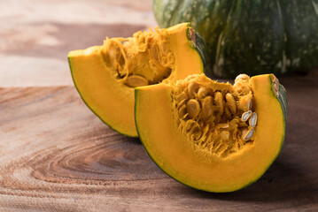 Green pumpkin on wooden background, Fresh vegetable, Food ingredient