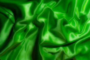 Vibrant green silky fabric with smooth folds and glossy texture. Ideal for luxury fashion, textile design, branding, nature-inspired themes, digital art, and eco-friendly product backgrounds