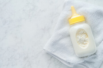 Baby formula preparation at home kitchen food photography clean environment overhead view parenting tips