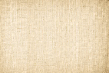 Closeup detail of beige fabric texture background. High resolution photo.