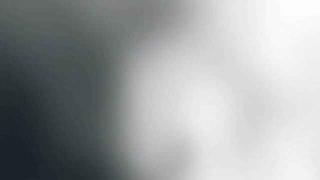 A soft-focus abstract image with a gradient of grayscale tones, evoking a sense of calm and tranquility.white texture montion background, Dark white motion gradient background.	
