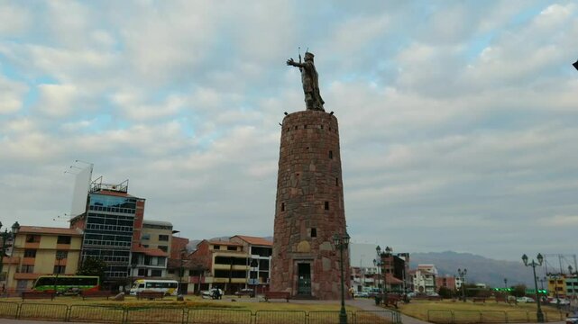 Fast moving orbit view of historical statue monument of Inca Pachacutec at &Oacute;valo de Pachacutec, Cusco, Peru