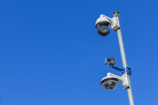 Three surveillance cameras on a pole, a high resolution camera with night vision, automatic number plate recognition (ANPR) and a 360 panoramic view camera.