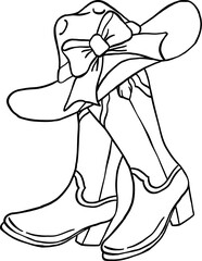 A stylish cowboy hat with a decorative ribbon resting on a pair of western boots with intricate designs