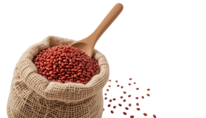 Pile red lentils in jute linen bag with wooden spoon PNG Image