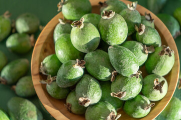 Feijoa green fruit bowl. Diet food. Guava harvest.