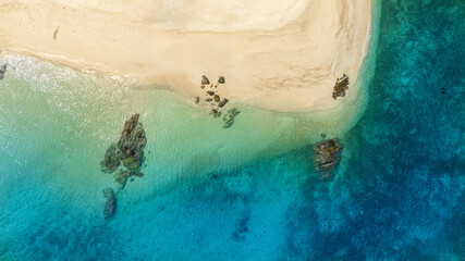 nature of the beach and sea Summer with sunshine, sandy beaches, clear blue waters sparkling against the blue sky. On an island with good ecology and environment Background for summer vacation
