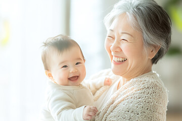 祖母と孫が一緒に笑っている（日本人・アジア人・家族・赤ちゃん）