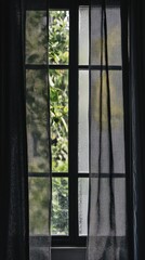 A window with a closed curtain, suitable for interior design or architecture scenes