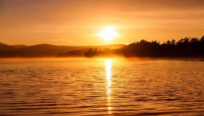 Gentle ripples on a lake at sunrise, with soft golden light reflecting off the calm surface, creating a serene and peaceful atmosphere