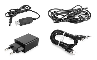 Different USB charge cables and power adapter on white background, set