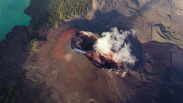 Aerial drone view of active Rinjani volcano during sunrise, Lombok, Indonesia