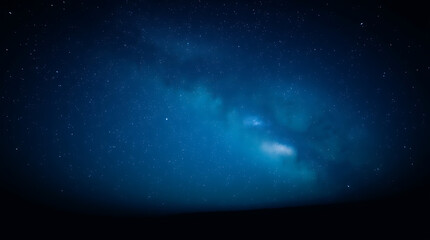Fototapeta premium blue night sky milky way and star on dark background with noise and grain, Created with generative AI.
