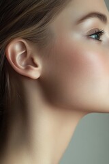 Fototapeta premium closeup portrait of young woman's neck and jawline natural skincare beauty