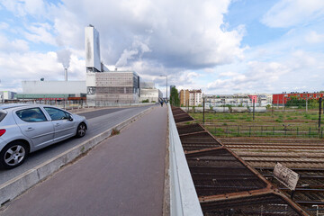 Incinerator and bridge over railroad tracks in Paris suburb