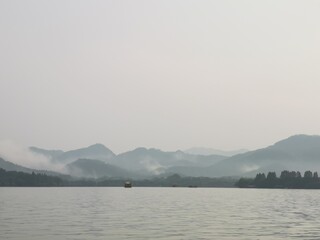 sea, water, lake, landscape, sky, nature, mountain, ocean, island, mountains, cloud, travel, boat, coast, bay, sunset, clouds, fog, ship, horizon, summer, scenic, view, blue, dawn