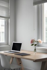 Cozy workspace in a modern room featuring a laptop, notebook, and fresh flowers during daylight hours