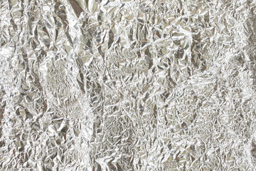 Shiny silver gray foil background or texture, horizontal shape