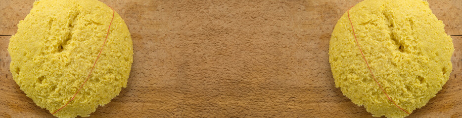 Hot steaming polenta on a old wooden board