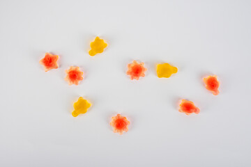 Assorted gummy candies, Juicy colorful jelly sweets. Gummy candies on white background