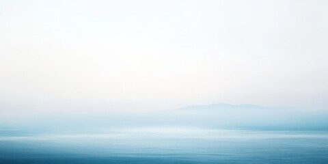 Fototapeta premium A serene expanse of deep blue water stretches beneath a light azure sky, framed by majestic mountains. Tranquil and pristine