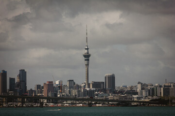 Obraz premium Retro style photo of a view over Auckland Harbour and a skyline of Auckland City from a suburb of Birkinhead. North Island, New Zealand