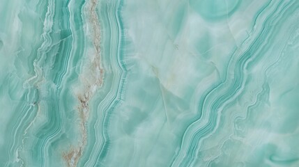 Pale turquoise onyx stone with smooth wave patterns. Natural mineral surface with subtle beige streaks, alongside glossy finish. Stone texture with flowing lines 