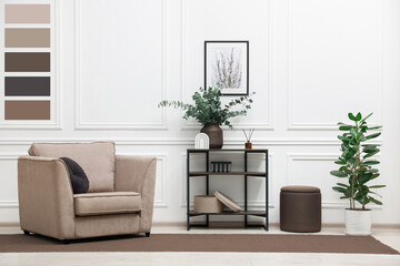Stylish living room with console table and other furniture in mocha mousse shade. Interior design...