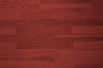 Texture of red wooden surface as background, closeup