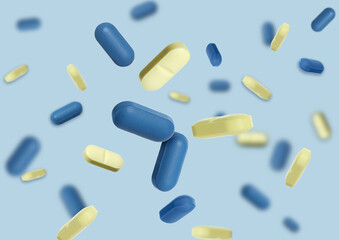 Many different pills flying on light blue background